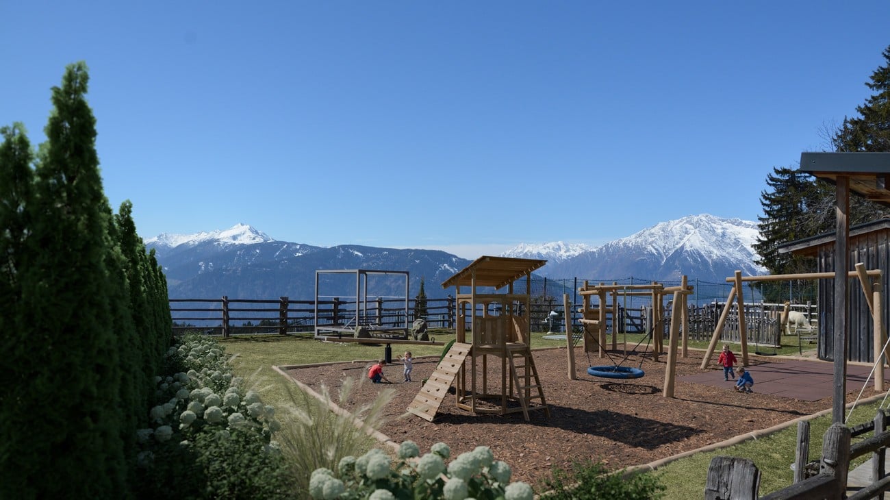 Children’s playground with slide tower, trampoline & climbing fun at the family hotel South Tyrol